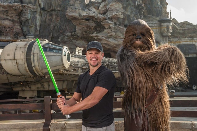 Matt Damon and Chewbacca at star wars: galaxy edge