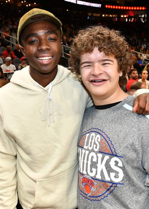 Caleb McLaughlin and Gaten Matarazzo at knicks game