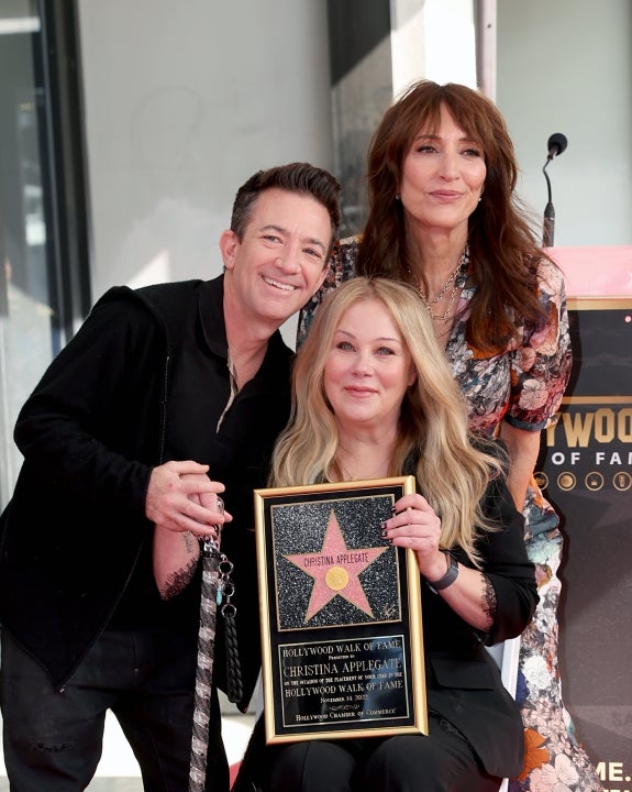 Christina Applegate's Married With Children co-stars, David Faustino, Katey Sagal, were on hand for her Hollywood Walk of Fame Ceremony on Nov. 14, 2022 in Los Angeles, California.