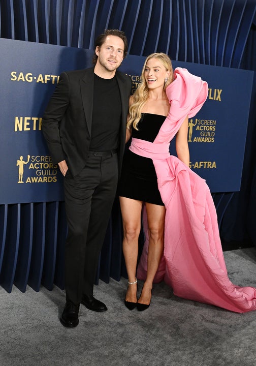 Tom Ackerley and Margot Robbie